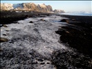 Ice on a Black Beach